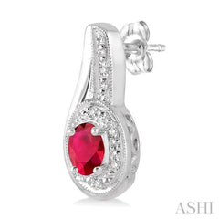 5x3 MM Oval Cut Ruby and 1/50 Ctw Round Cut Diamond Earrings in Sterling Silver