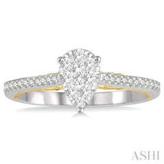 1/3 Ctw Pear Shape Round Cut Diamond Lovebright Ring in 14K White and Yellow gold.