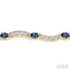 4x3 MM Oval Cut Sapphire and 1/10 Ctw Single Cut Diamond Bracelet in 14K Yellow Gold