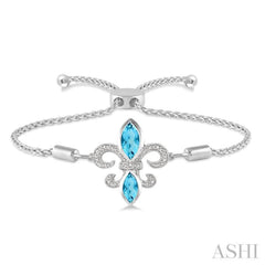 1/20 Ctw Round Diamond and Marquise 10x5 MM & 8x4 MM Blue Topaz Fleur De Lis Sterling Silver Lariat Bracelet