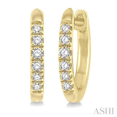 1/8 Ctw Round Cut Diamond Huggie Earrings in 10K Yellow Gold