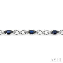 5x3 MM Oval Cut Sapphire and 1/10 Ctw Single Cut Diamond Bracelet in 10K White Gold