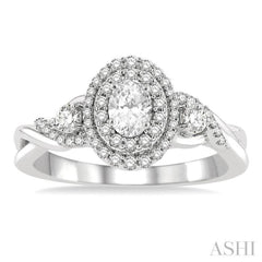 5/8 Ctw Split Twisted Shank Round Cut Diamond Engagement Ring With 1/4 ct Oval Cut Center Stone in 14K White Gold