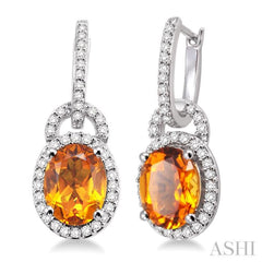 9x7 MM Oval Cut Citrine and 3/8 Ctw Round Cut Diamond Earrings in 14K White Gold