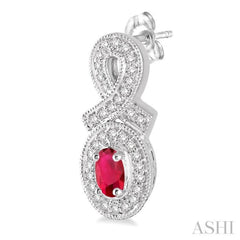 5x3 MM Oval Cut Ruby and 1/3 Ctw Round Cut Diamond Earrings in 14K White Gold