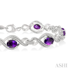 1/10 Ctw Round Cut Diamond & 7x5 MM Oval Cut Amethyst Semi Precious Bracelet in Sterling Silver