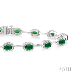 5/8 Ctw Round Cut Diamond & 5x3 MM Oval Cut Emerald Precious Bracelet in 14K White Gold