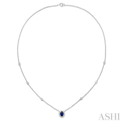 6X4MM Oval Cut Sapphire and 1/6 Ctw Round Cut Diamond Necklace in 14K White Gold