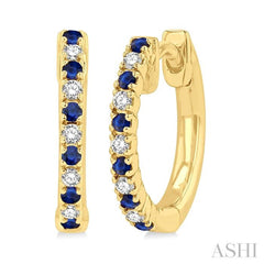 1/10 ctw Petite 1.35 MM Sapphire and Round Cut Diamond Precious Fashion Huggies in 10K Yellow Gold