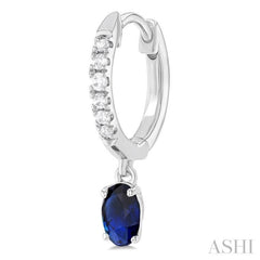 5x3 MM Oval Cut Sapphire and 1/8 Ctw Petite Round Cut Diamond Precious Fashion Huggies in 10K White Gold